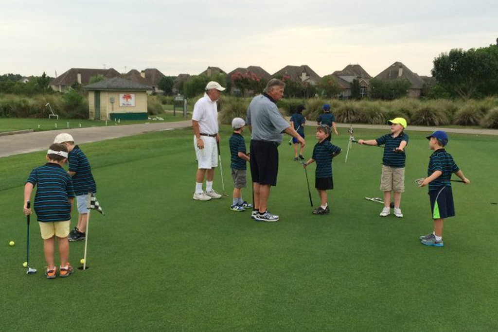 Golfers on golf course 